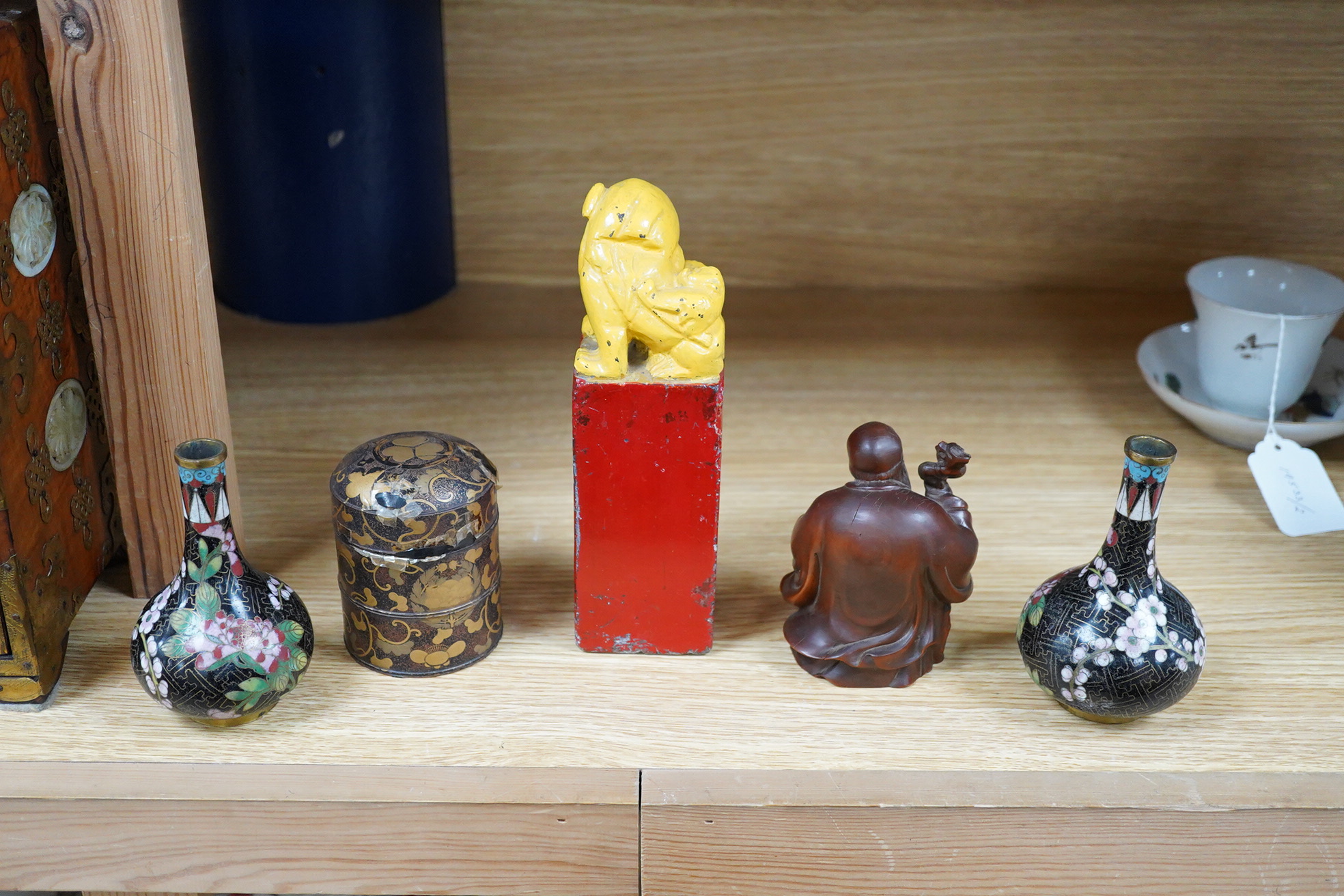 A pair of Chinese cloisonné enamel vases, a soapstone seal, an 18th century Japanese lacquer box and a wood figure of Shou Lao, tallest 19cm